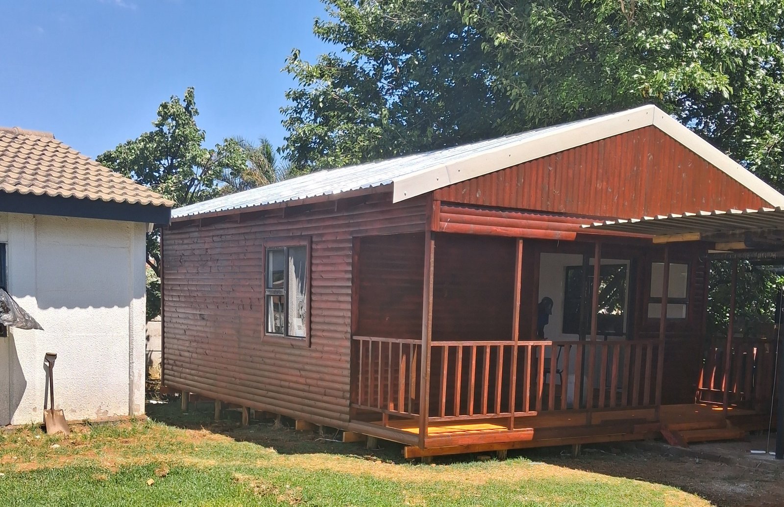 Completed Nutec home with veranda and roof